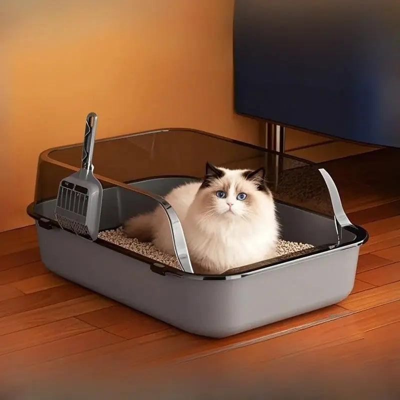 Gray splashproof semi-enclosed cat litter box with high sides, ideal for indoor kittens, by TrendyPet's Zone.
