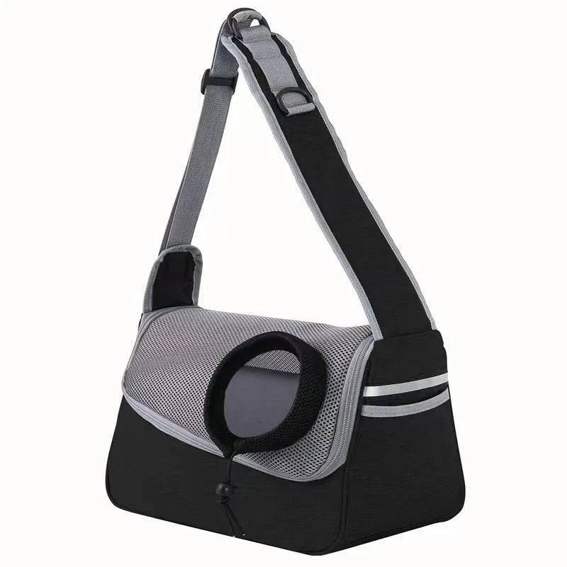 Black and grey TrendyPet's Zone portable crossbody pet carrier with breathable mesh for dogs and cats on one shoulder.