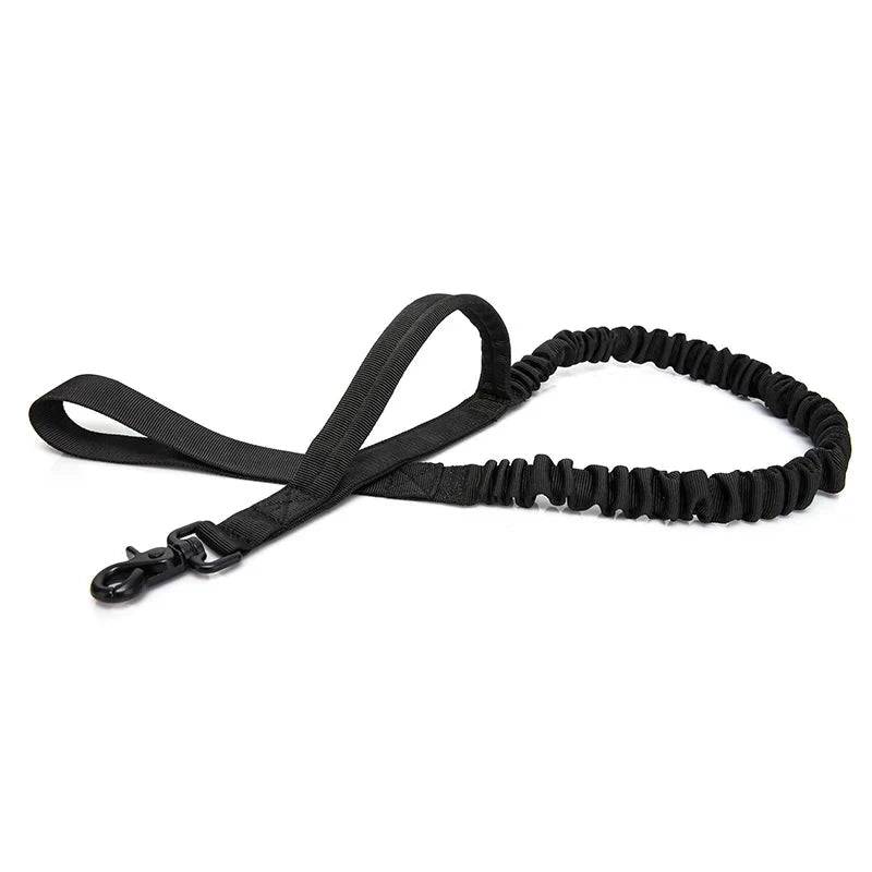 Black tactical dog harness and leash set with military-style design and adjustable straps for pets.