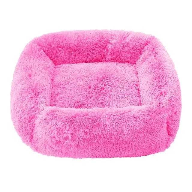 Pink glitter fluffy dog sofa bed with plush fabric, rectangular shape, suitable for small to large dogs, cozy indoor pet sleeping kennel.