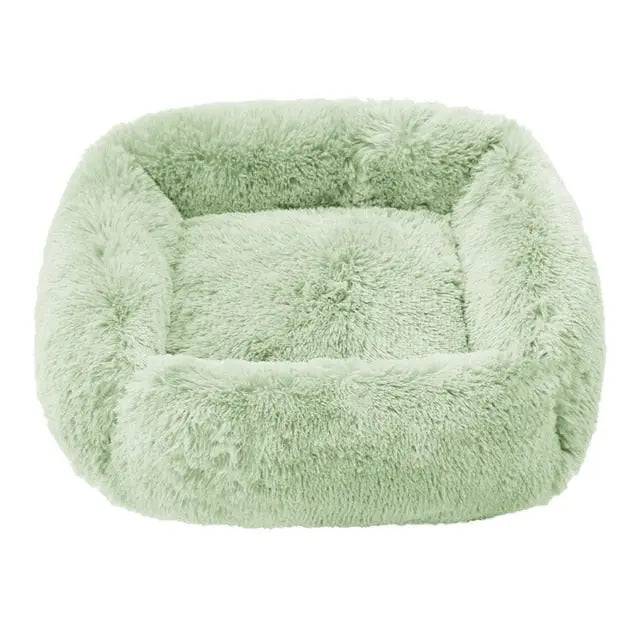 Light green fluffy dog sofa bed with plush interior, rectangular shape, suitable for small to large dogs, cozy indoor pet sleeping space.