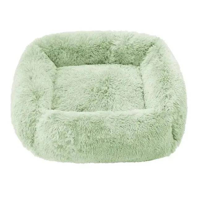 Light green fluffy dog sofa bed with plush interior, rectangular shape, suitable for small to large dogs, cozy indoor pet sleeping spot.