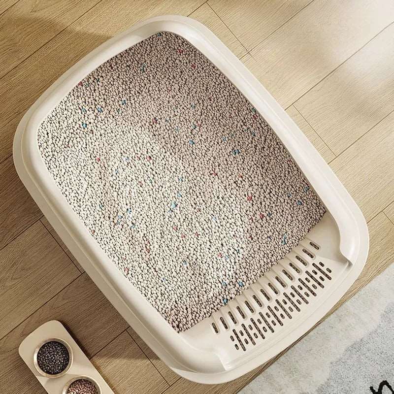 Pink TrendyPet's Zone cat litter box with anti-splash design, suitable for kittens and small cats, featuring a tray for easy cleaning.