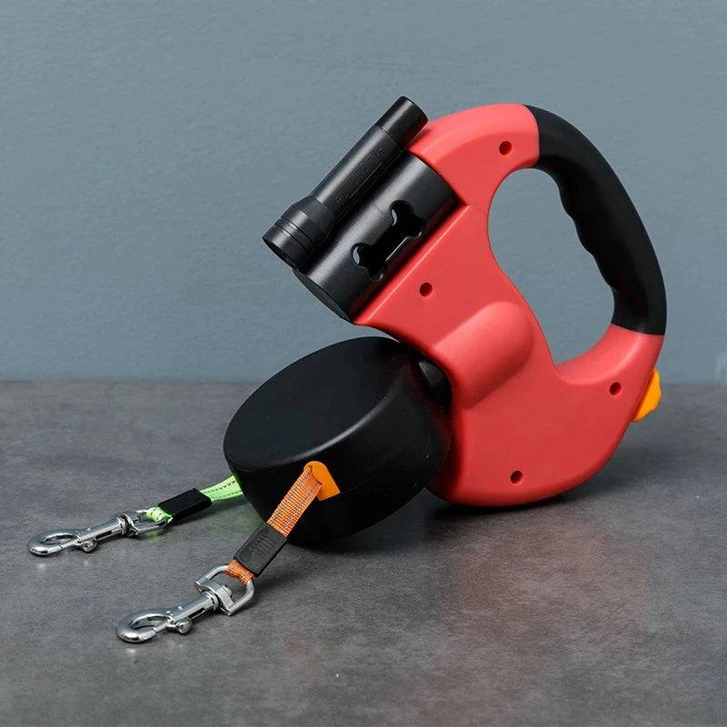 Red TrendyPet's Zone double automatic retractable dog leash with 360-degree rotating dual rope, flashlight, and garbage bag storage.