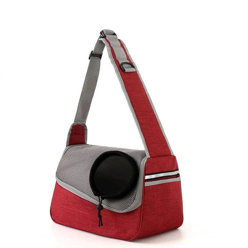 Red TrendyPet's Zone portable pet crossbody carrier with breathable mesh for dogs and cats, designed for comfortable one-shoulder carrying.