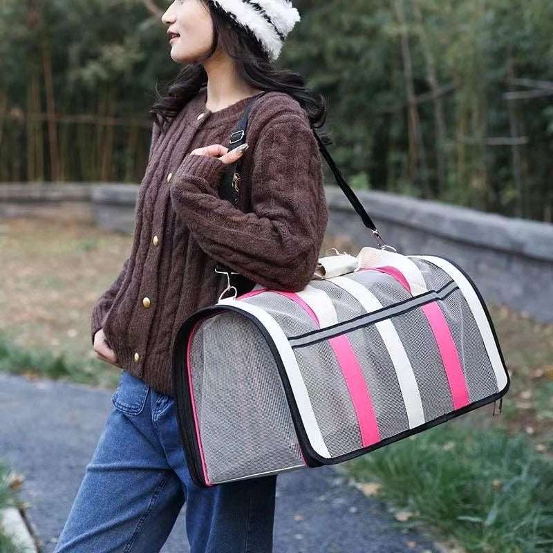 Rose red pet carrier bag by TrendyPet's Zone, large capacity, breathable shoulder bag for outdoor use, suitable for all seasons.