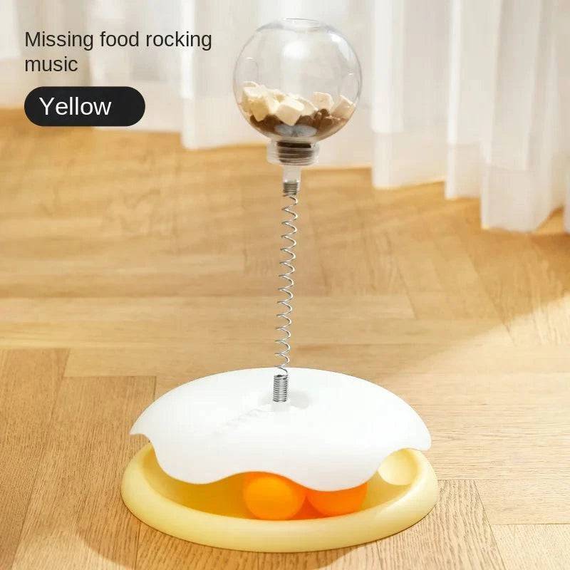 Yellow cat puzzle toy by TrendyPet's Zone featuring a leaking ball design for interactive treat dispensing and feline play.