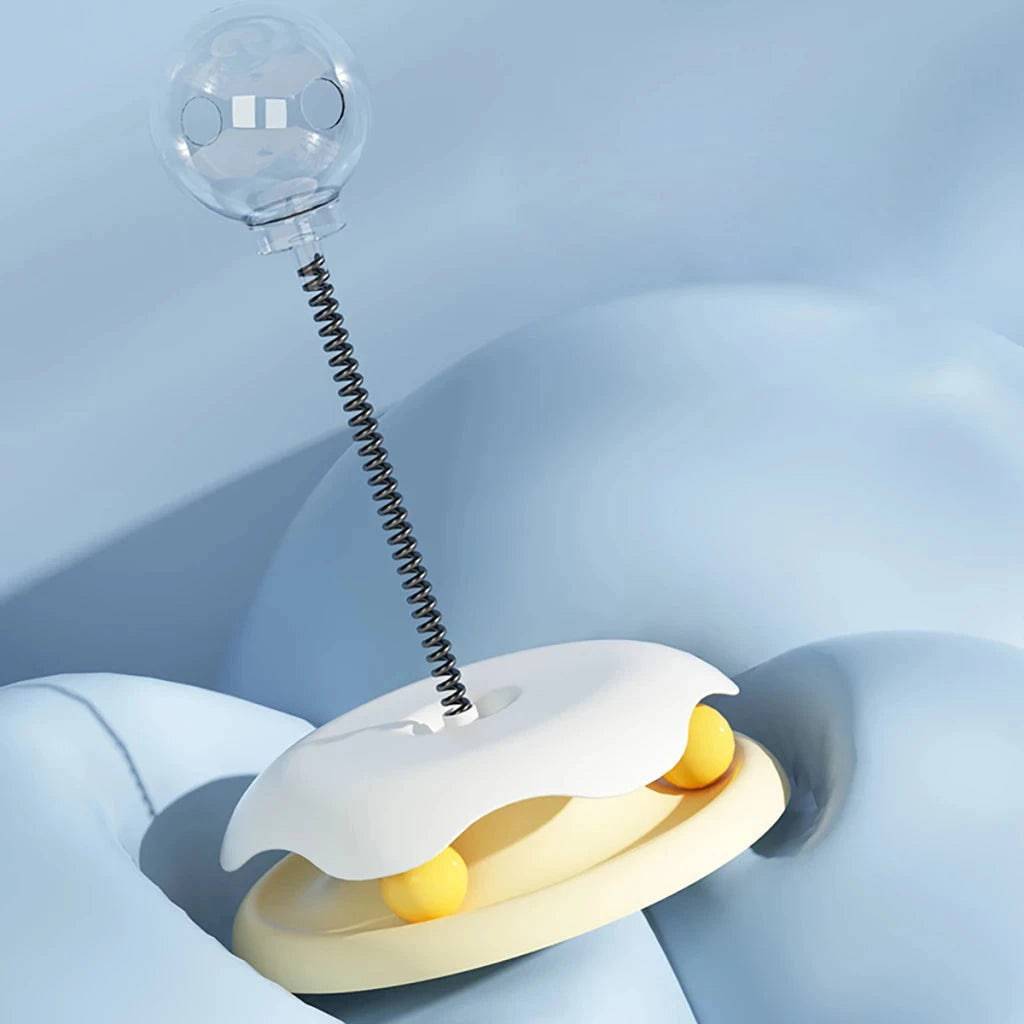 Yellow cat puzzle toy by TrendyPet's Zone, interactive treat dispenser with a leaking ball design for kittens.
