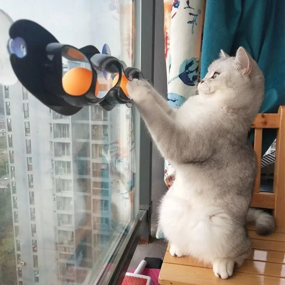 Interactive TrendyPet's Zone cat toy featuring a window-adsorbing roller ball designed to entertain cats and promote playful activity.