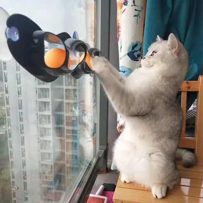 Interactive TrendyPet's Zone cat toy featuring a window-adsorbing roller ball designed to entertain cats and promote playful activity.