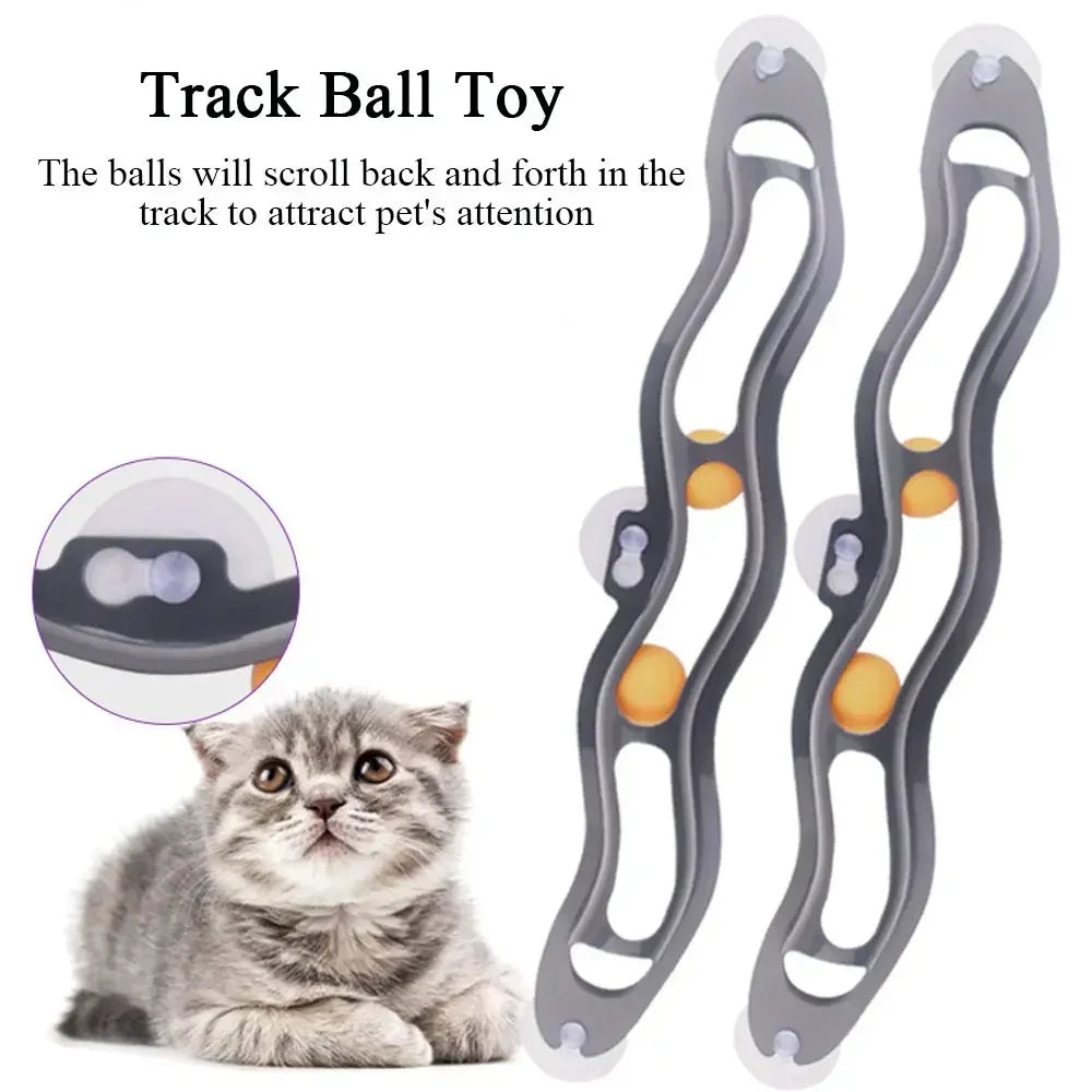 Interactive cat toy roller ball with funny design, adsorbs to windows for playful feline entertainment by TrendyPet's Zone.