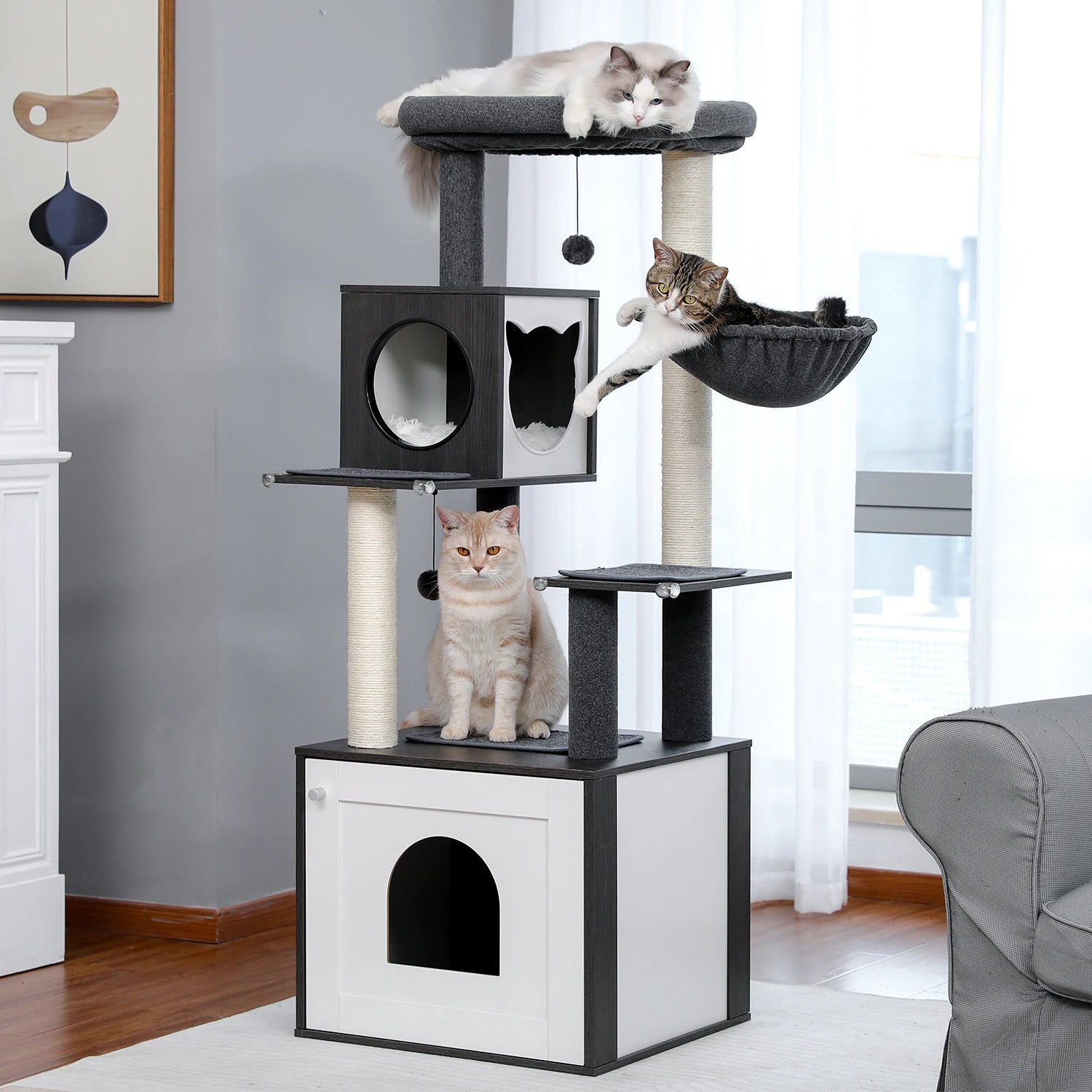 Black luxury cat tree tower with wooden posts, spacious perch, cabinet, toy, sleep hammock, ideal for scratching and lounging.