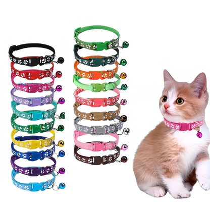 Colorful TrendyPet's Zone nylon cat collar with bell, featuring a soft paw print design, shown on a pink-collared cat.