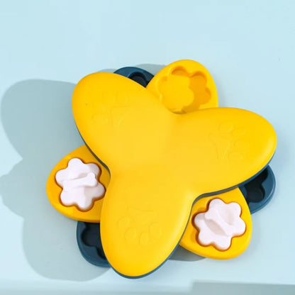 Yellow interactive puzzle feeder bowl for dogs and cats by TrendyPet's Zone, designed to slow feeding and engage pets.