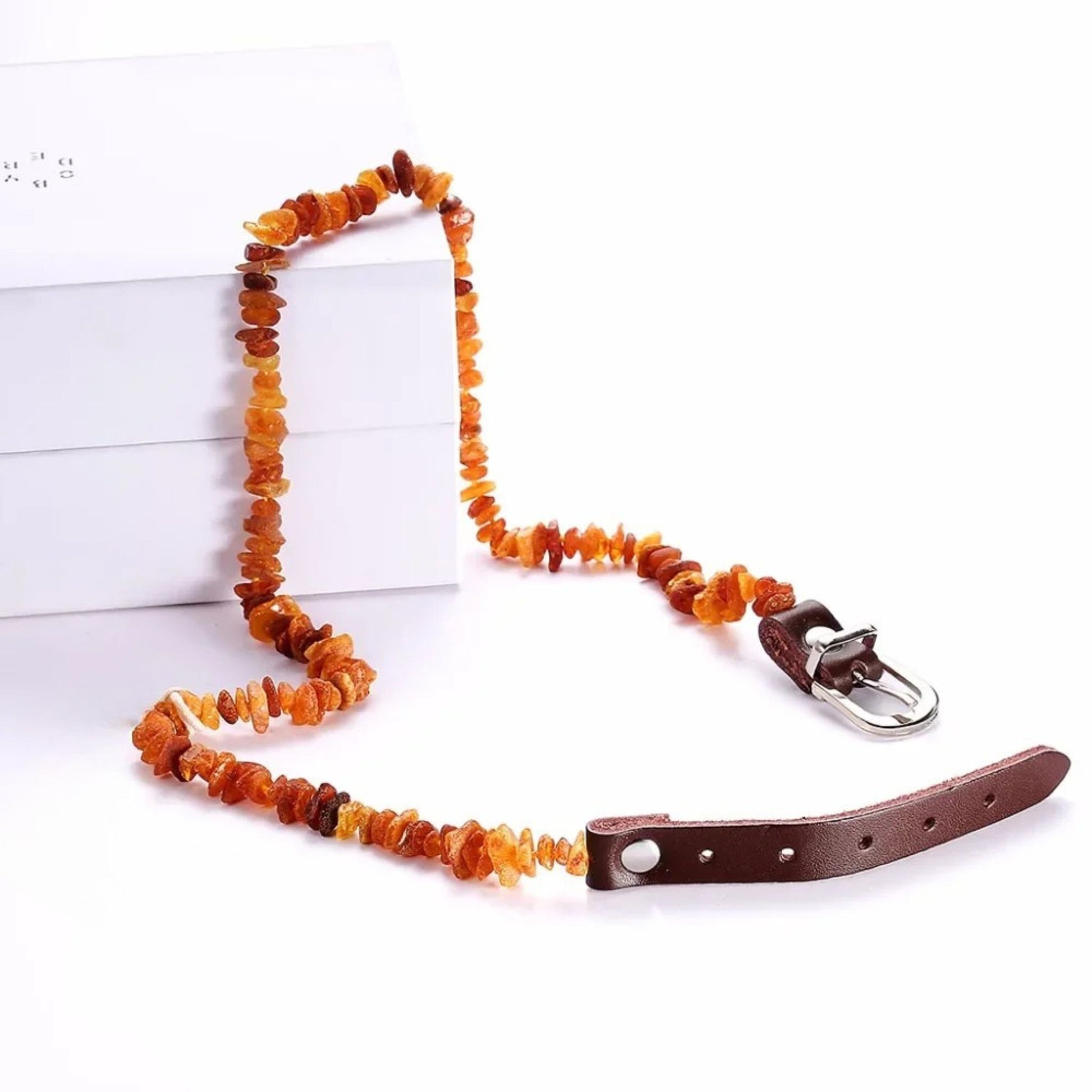 Raw Baltic Amber flea and tick collar for dogs and cats, natural pet collar with adjustable leather strap by TrendyPet's Zone.