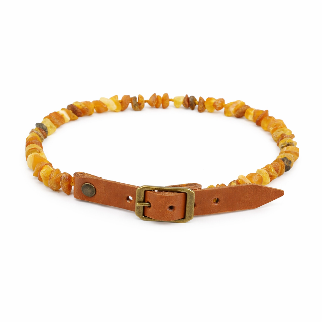 Raw Baltic Amber flea and tick collar for dogs and cats by TrendyPet's Zone with an adjustable leather strap and natural amber stones.