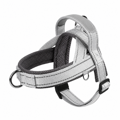 Light gray reflective no-pull dog harness with handle and adjustable nylon straps for small to large dogs, designed by TrendyPet's Zone.