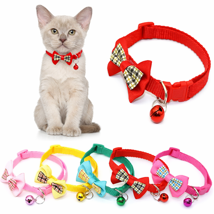 Pink adjustable cat collar with bell and bow, stylish and comfortable, from TrendyPet's Zone, featuring a secure buckle and decorative accents.