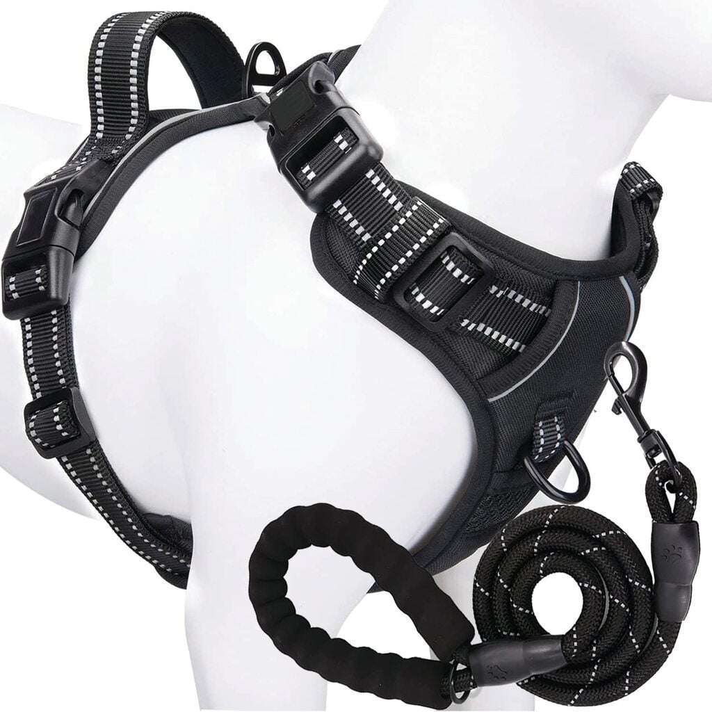 Black adjustable no-pull dog harness with easy control handle from TrendyPet's Zone, shown on a dog with secure fit and padded straps.