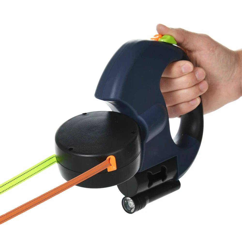 Dark blue TrendyPet's Zone double automatic retractable dog leash with 360-degree rotating handle, flashlight, and garbage bag storage.