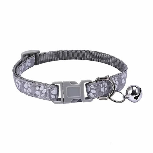 Gray adjustable nylon cat collar with bell and paw print design, suitable for cats and small dogs, by TrendyPet's Zone.