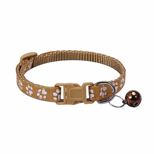 Light brown adjustable nylon cat collar with bell and paw print design, suitable for cats and small dogs, in 19 color options.