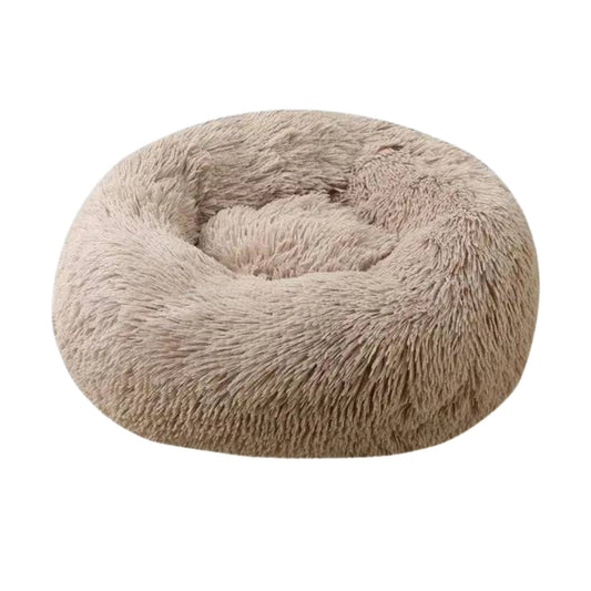 Light brown round plush pet bed by TrendyPet's Zone with thick padding, zipper, and soft, calming design for dogs and cats.