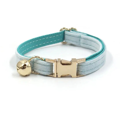 Light cyan personalized cat and small dog collar with bell and engraved ID tag, suitable for puppies, bulldogs, chihuahuas, and Yorkshires.