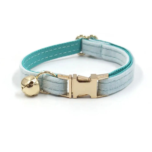 Light cyan personalized cat and small dog collar with bell and engraved ID tag, suitable for puppies, bulldogs, chihuahuas, and Yorkshires.
