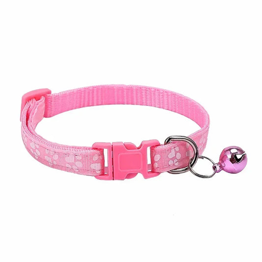 Light pink adjustable nylon cat collar with bell and paw print design, suitable for cats and small dogs, from TrendyPet's Zone.