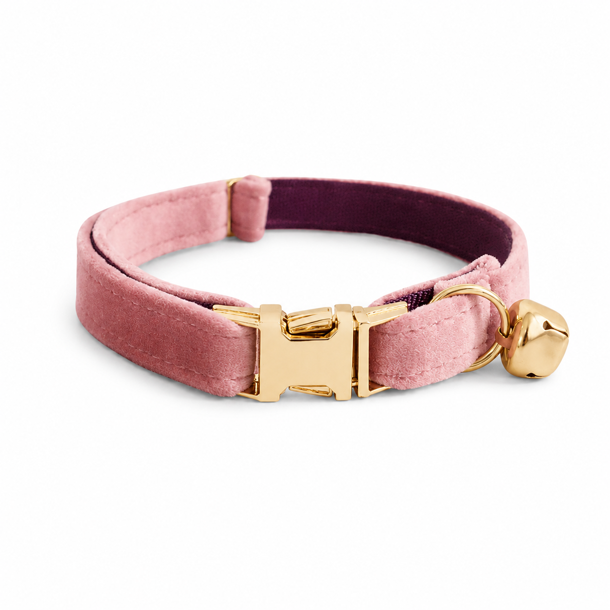 Light pink personalized dog collar with bell and engraved ID tag, suitable for small dogs, puppies, and kittens.
