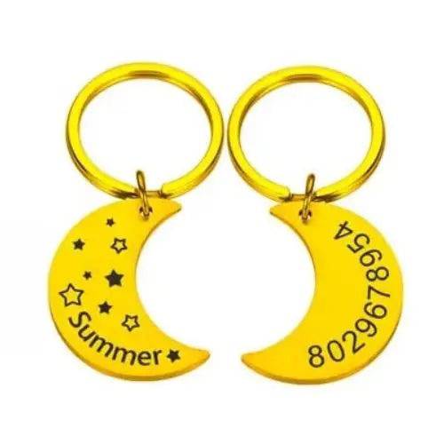 Personalized Moon Pet ID Tag engraved with name and phone number for cats, puppies, and dogs, attached to a keyring.