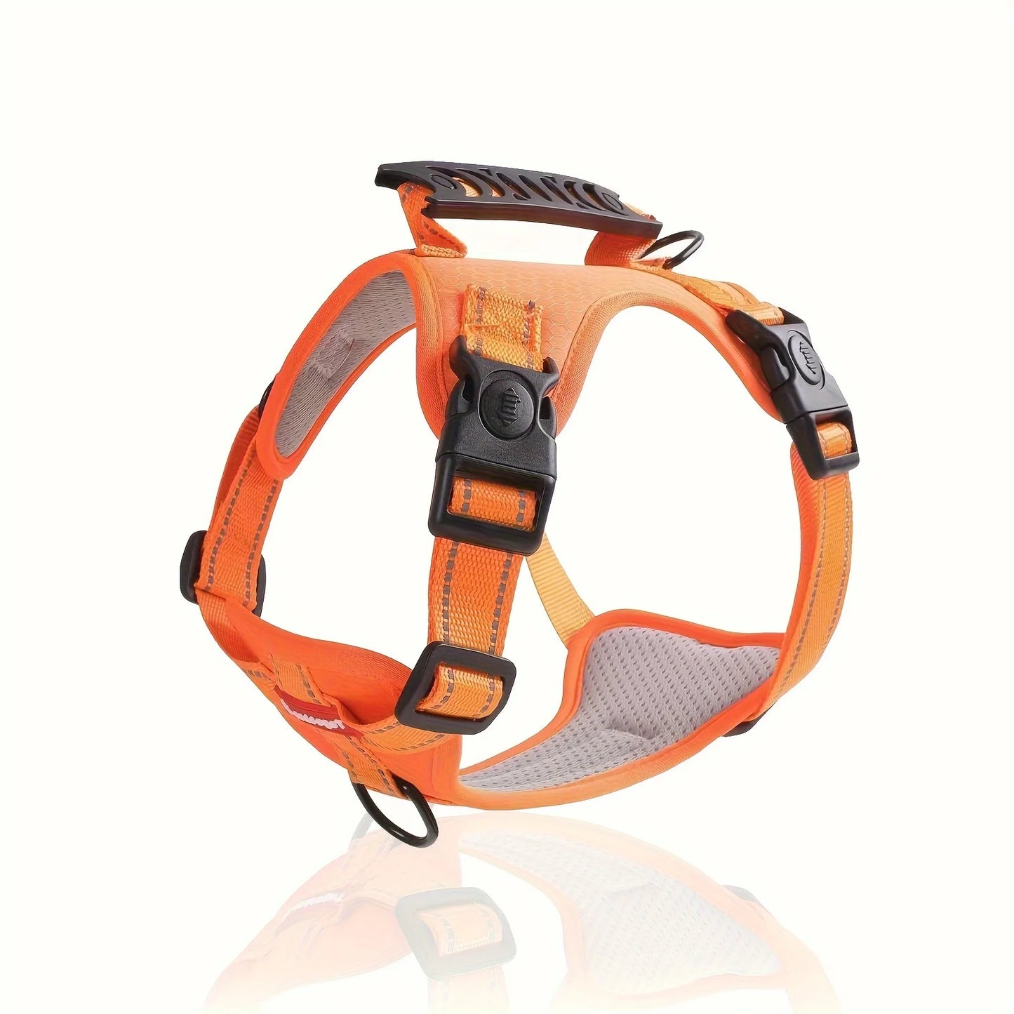Orange soft no-pull dog harness with adjustable strap and easy control handle, designed for comfortable, gentle walking.