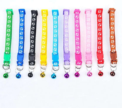 Colorful adjustable nylon cat collar with bell and paw print design, suitable for cats and small dogs, from TrendyPet's Zone.