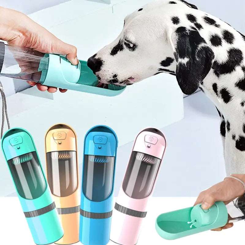 Pink portable pet dog water bottle with built-in drinking bowl for small and large dogs, by TrendyPet's Zone.