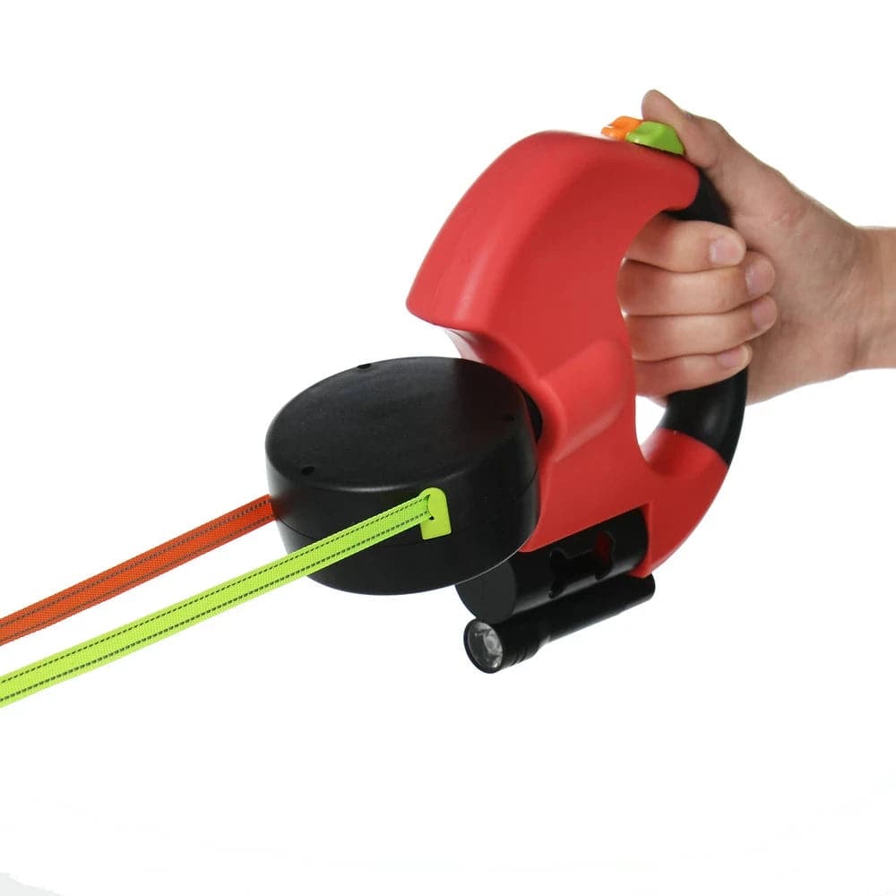 Red TrendyPet's Zone double-ended auto retractable dog leash with flashlight, garbage bag holder, and 360-degree rotating handle.
