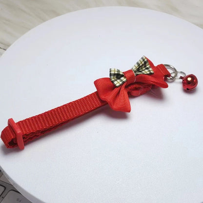 Red adjustable cat collar with bell and bow, stylish and comfortable, from TrendyPet's Zone.