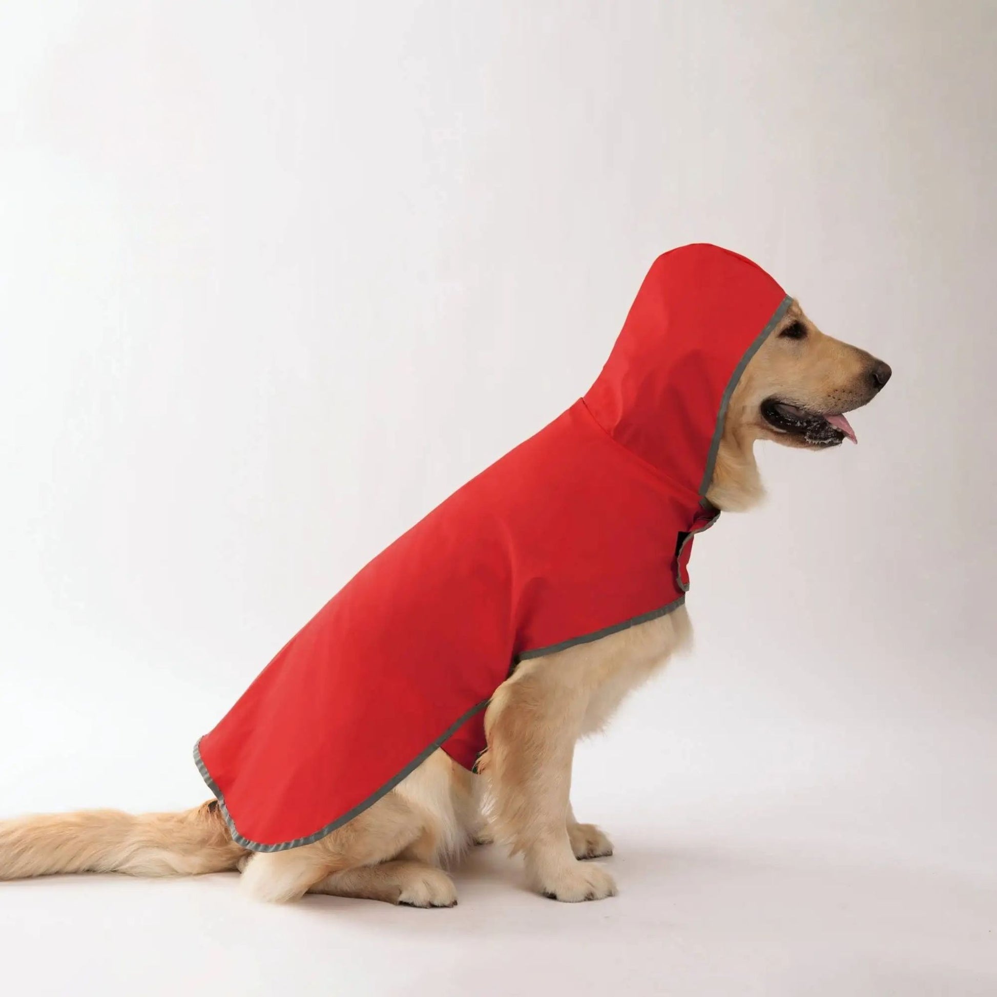 Red waterproof dog raincoat with quick-adjust dual-sided design, suitable for all weather from TrendyPet's Zone.