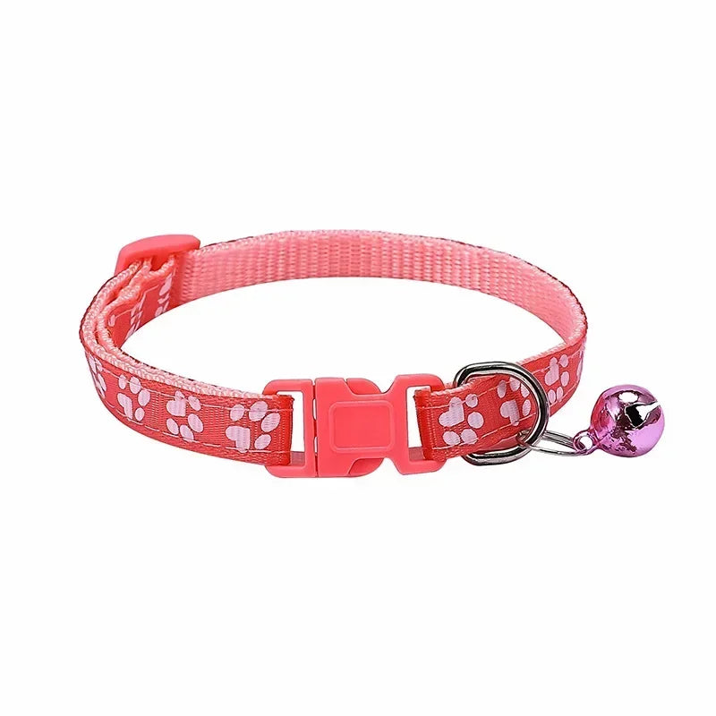 Salmon nylon cat collar with bell in pink worn by a cat, part of TrendyPet's Zone adjustable pet collar collection in various colors.