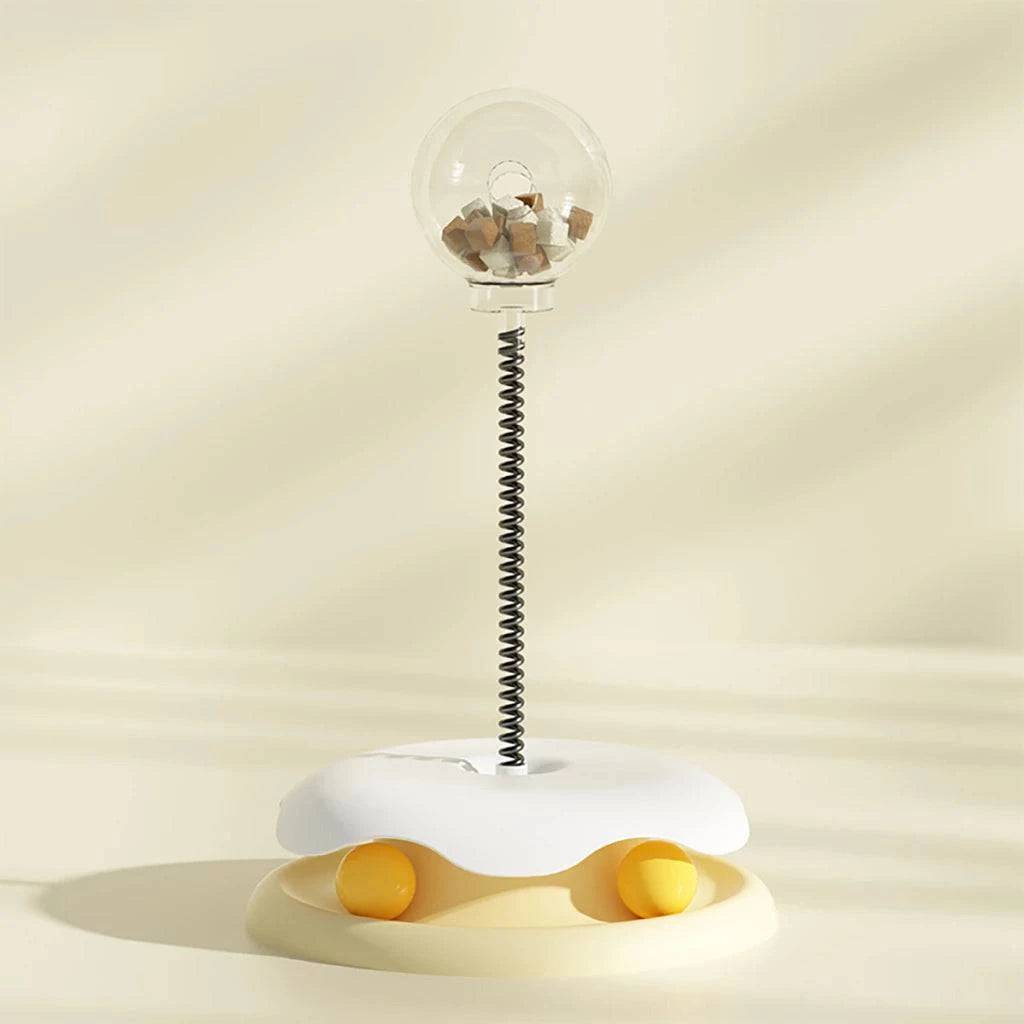 Yellow cat puzzle toy by TrendyPet's Zone, a food-leaking ball treat dispenser for kittens, interactive indoor slow feeder.