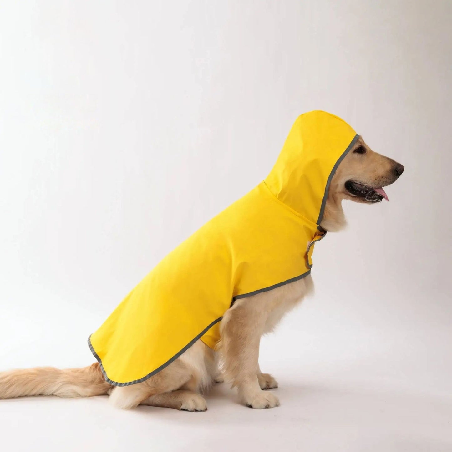 Yellow waterproof dog raincoat by TrendyPet's Zone with quick-adjust dual-sided design for all weather conditions.